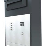 Post with integrated mailbox, intercom system and code keypad for comfort variants